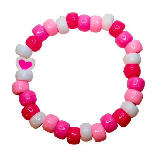 Pink and White Beaded Bracelet with a "Heart" Charm.